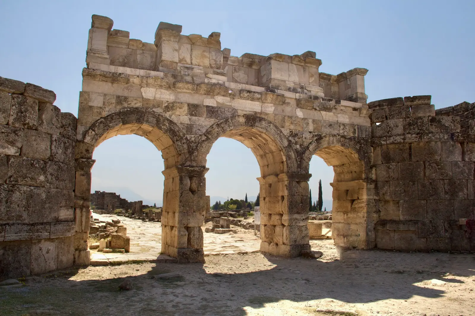 The Frontinus Gate of Hierapolis, three stone arches on the colonnaded street